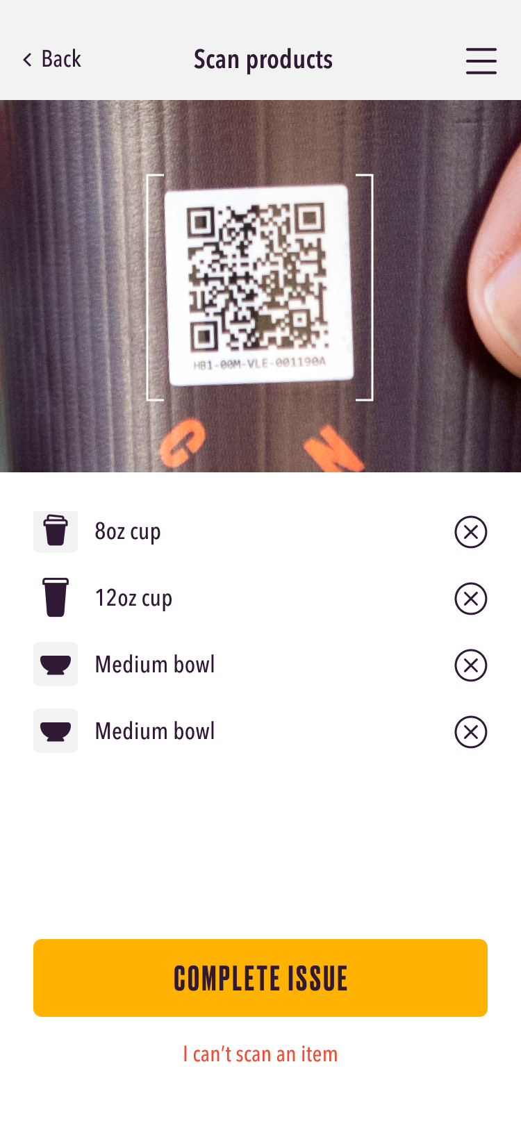The issue product screen in the trader app. The top half of the screen is a view through the device's camera, showing a cup's QR code being scanned. Underneath, there's a list of items that have been scanned.